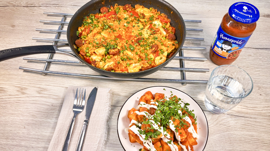 chicken chorizo and prawn paella and spicy patatas bravas